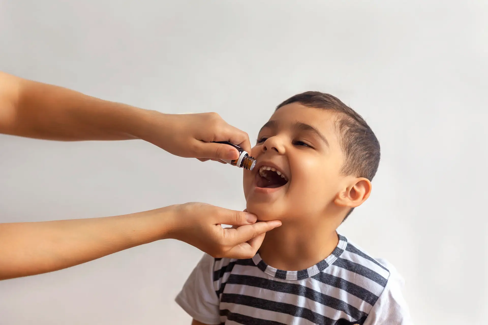 photo of child getting oral vaccine