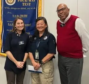 Picture of N. Charleston Rotary president Dawn Balsam, Coastal Crisis Chaplaincy representative, and Grant Committee chair Troy Strother