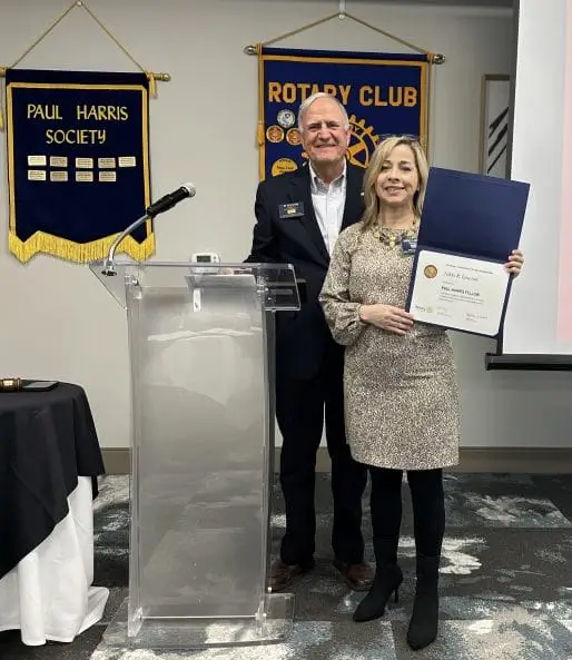 Photo of Kevin Isaac and newest Paul Harris Society member, Nikki Lawson